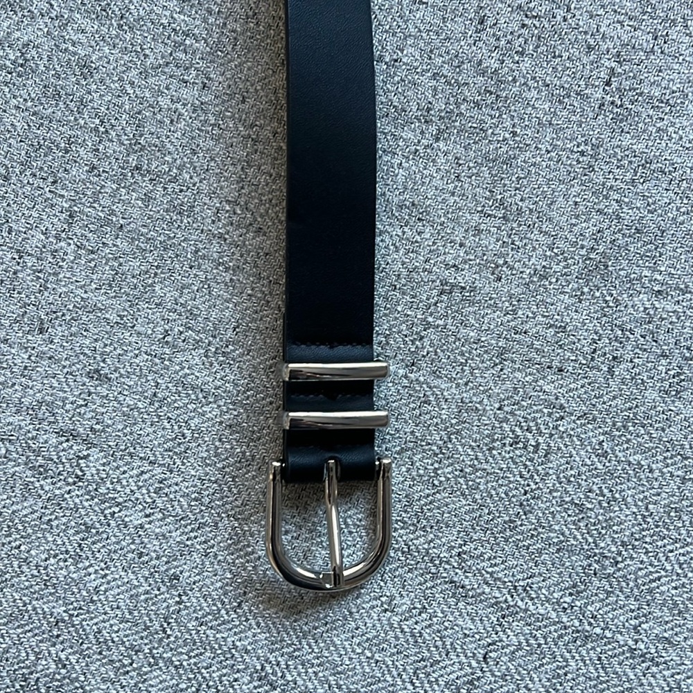 Black faux leather belt silver detail
